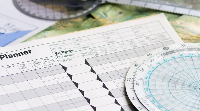 paper navigation log document for flight planning in aviation